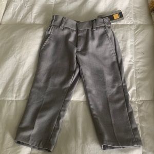 Brand new dress pants. Ordered for a wedding and too small, passed return.